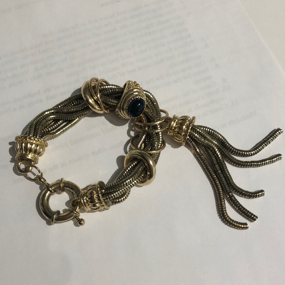 Gold metal tassel & ring bracelet   $15
